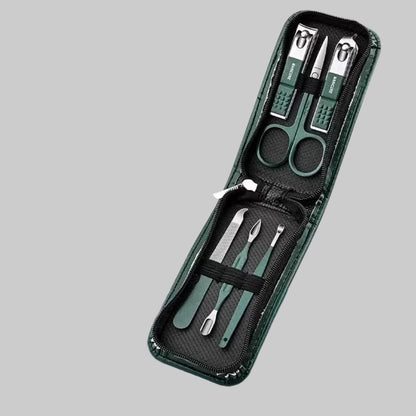 Manicure set with green case on a white and teal background