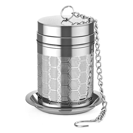 Stainless steel tea infuser with chain on a white background