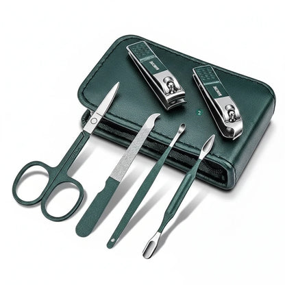 Set of nail care tools including scissors, clippers, and a case on a white background