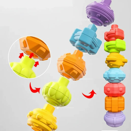 Colorful mosaic stack high toy with different shapes and colors on a gray background.
